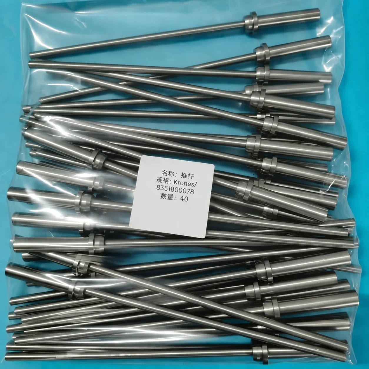 Batch-produced capping head rods after quality inspection