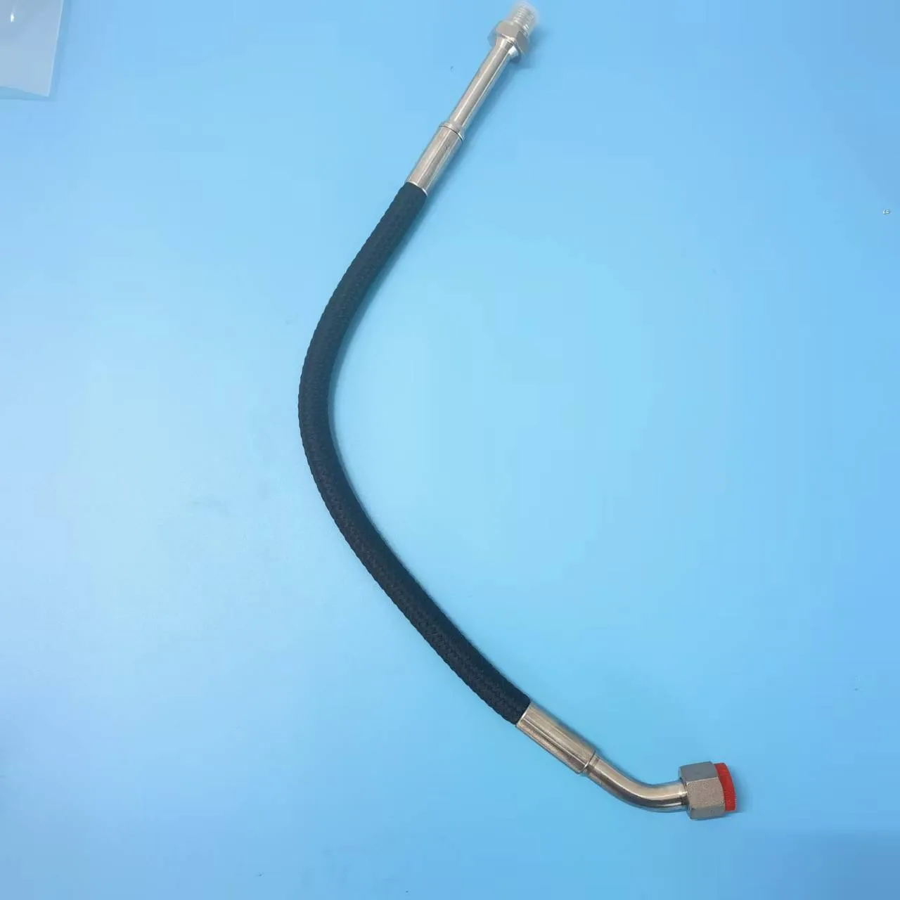 Hose assembly with angled end fitting