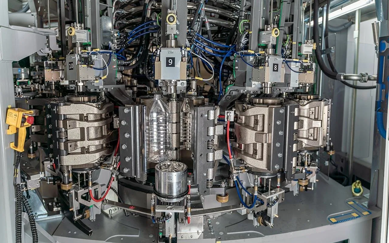 Reference view of PET stretch blow unit and moulds